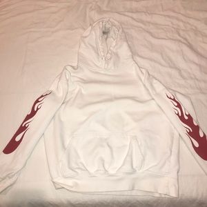White sweatshirt with flames on the arm sleeve